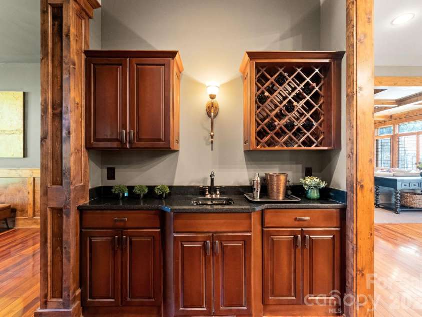 4068 Flagstone Drive, Lancaster, SC 29720.  MLS# CAR4347552, YatesRealty ID 15387. Wet bar connects kitchen area and dining room