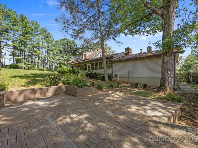 213 Monticello Road, Weaverville, NC 28787.  MLS# CAR4228856, YatesRealty ID 15391. Patio in backyard