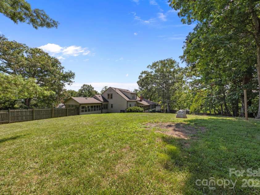 213 Monticello Road, Weaverville, NC 28787.  MLS# CAR4228856, YatesRealty ID 15391. Spacious backyard