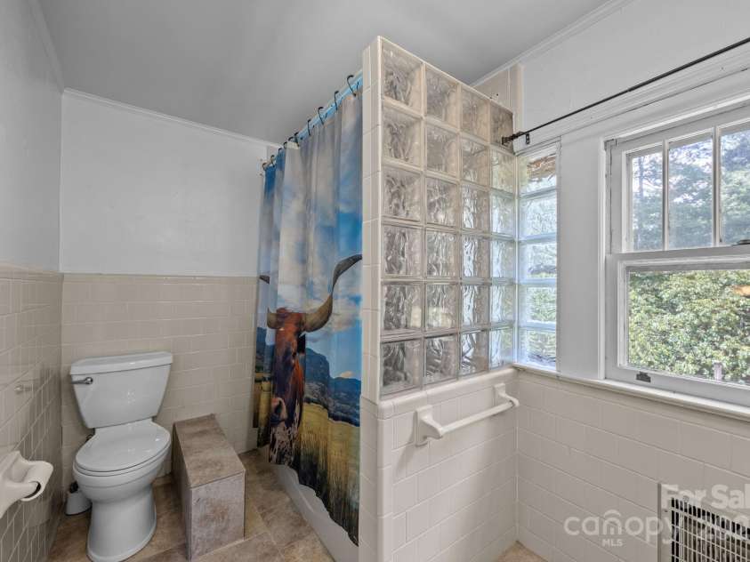 213 Monticello Road, Weaverville, NC 28787.  MLS# CAR4228856, YatesRealty ID 15391. Upstairs bathroom