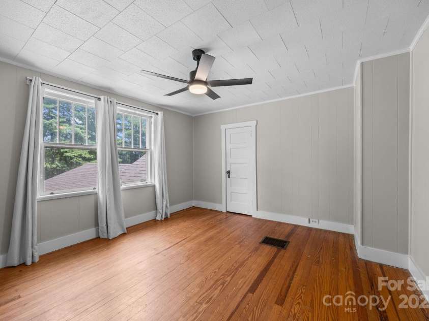 213 Monticello Road, Weaverville, NC 28787.  MLS# CAR4228856, YatesRealty ID 15391. Upstairs bedroom (1st of 2)