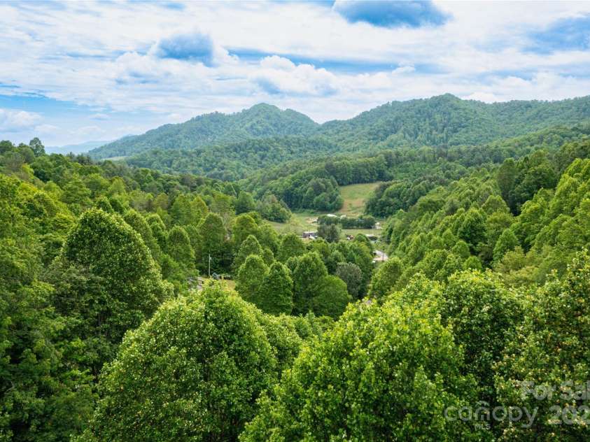 214 Hidden Creek Lane, Burnsville, NC 28714.  MLS# CAR4258635, YatesRealty ID 15395. 