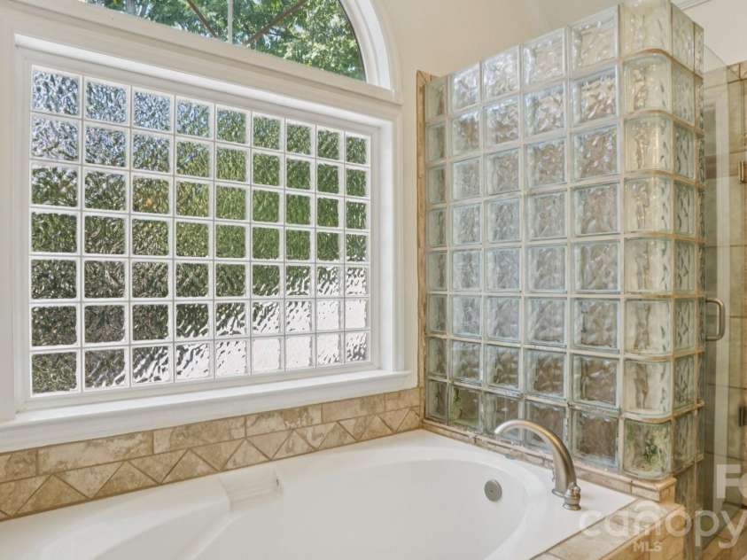 5212 Shannamara Drive, Matthews, NC 28104.  MLS# CAR4372618, YatesRealty ID 15399. 