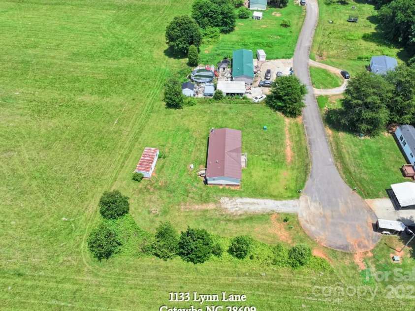 1133 Lynn Lane, Catawba, NC 28609.  MLS# CAR4275480, YatesRealty ID 1540. Aerial view of the home on the lot