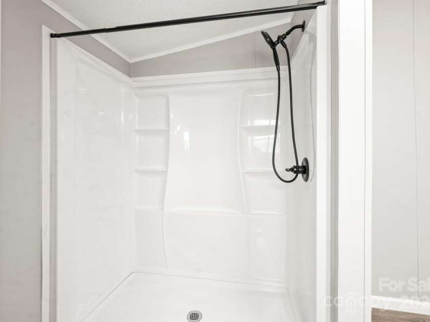 1133 Lynn Lane, Catawba, NC 28609.  MLS# CAR4275480, YatesRealty ID 1540. Shower enclosure with new fixtures
