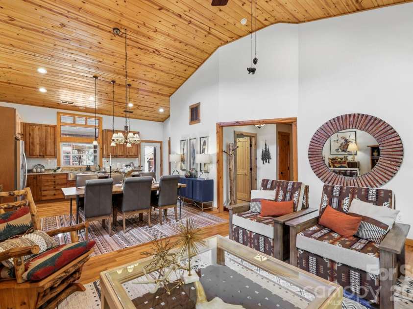 107 5th Street, Black Mountain, NC 28711.  MLS# CAR4371363, YatesRealty ID 15401. Open Living Room, Dining, and Kitchen