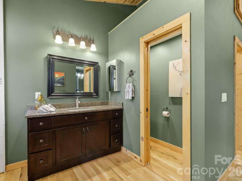 107 5th Street, Black Mountain, NC 28711.  MLS# CAR4371363, YatesRealty ID 15401. Toilet Closet