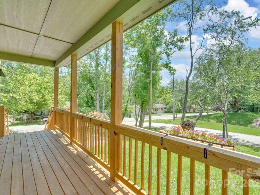 30 Spaulding Drive, Candler, NC 28715.  MLS# CAR4255062, YatesRealty ID 15406. Covered front porch