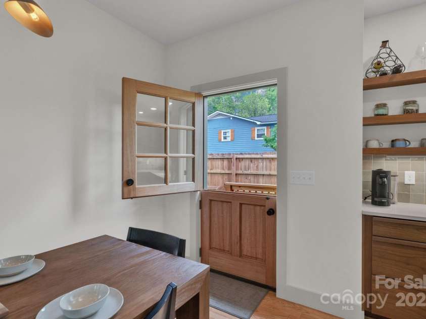 30 Spaulding Drive, Candler, NC 28715.  MLS# CAR4255062, YatesRealty ID 15406. Dutch door to back yard