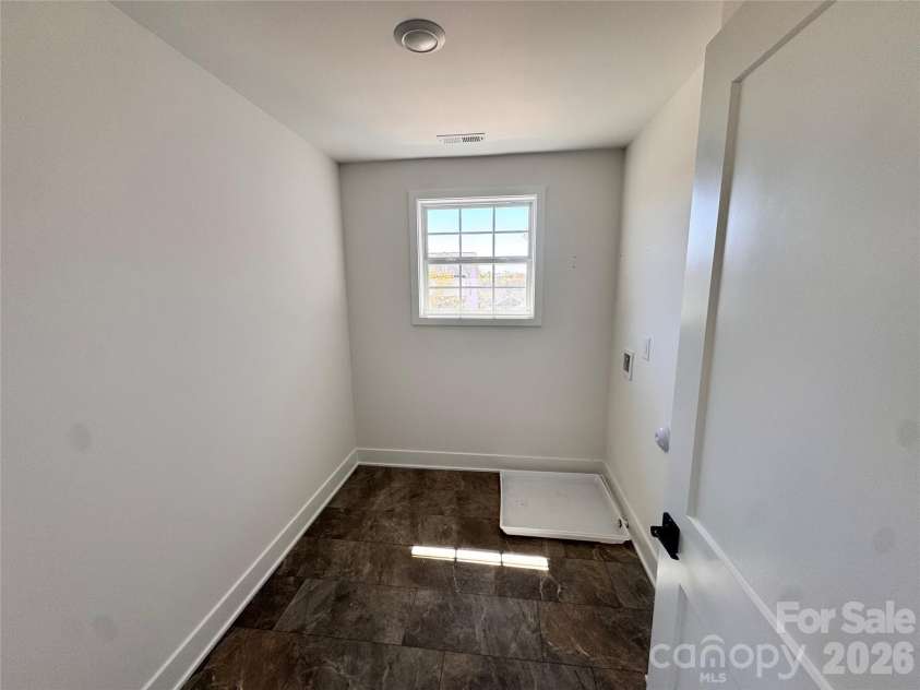 724 Inwood Hill Drive, Gastonia, NC 28056.  MLS# CAR4324666, YatesRealty ID 15408. Laundry room