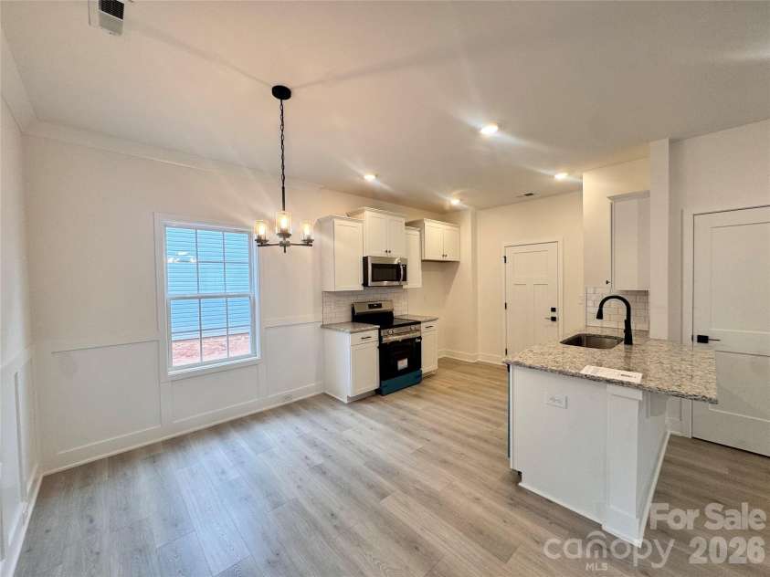 720 Inwood Hill Drive, Gastonia, NC 28056.  MLS# CAR4327035, YatesRealty ID 15409. Dining area and kitchen