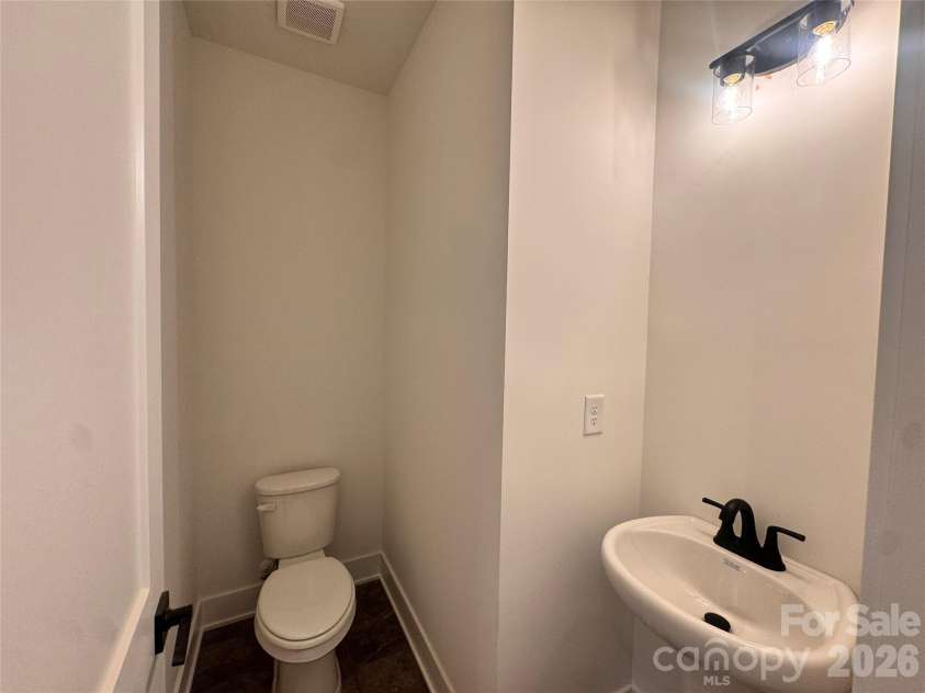 720 Inwood Hill Drive, Gastonia, NC 28056.  MLS# CAR4327035, YatesRealty ID 15409. Half bathroom