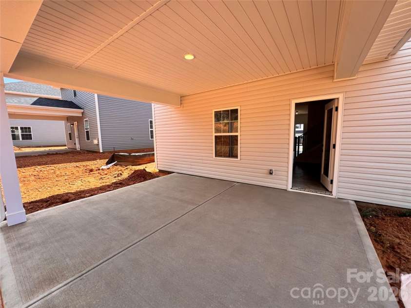 716 Inwood Hill Drive, Gastonia, NC 28056.  MLS# CAR4327869, YatesRealty ID 15410. Back patio