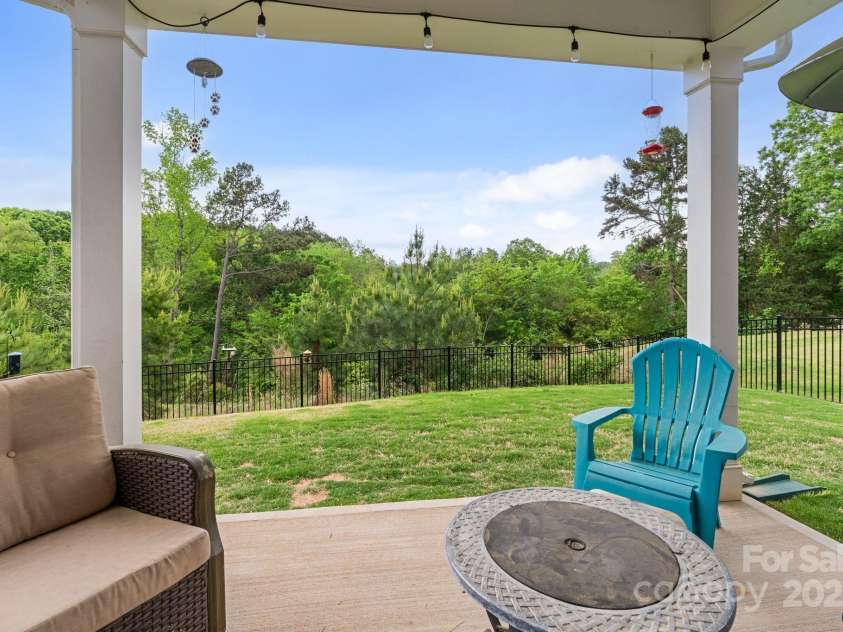 190 Tetcott Street, Mooresville, NC 28115.  MLS# CAR4249348, YatesRealty ID 15411. Covered Back Patio