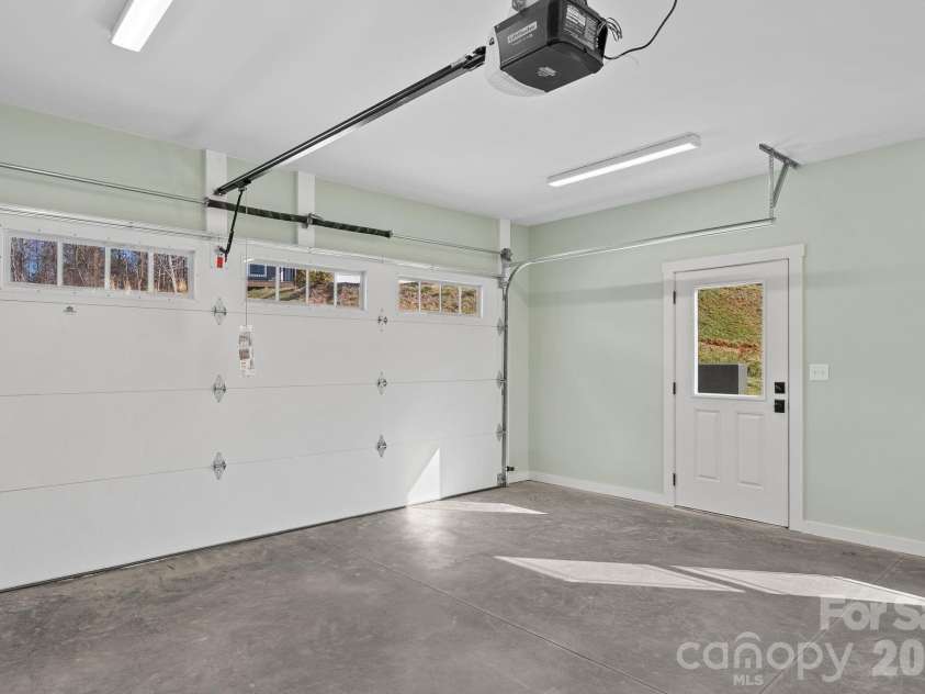 56 White Oak Place, Mars Hill, NC 28754.  MLS# CAR4334521, YatesRealty ID 15413. Nice sized attached garage