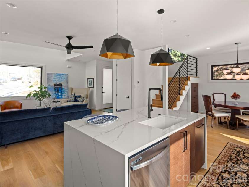 60 Harvard Place, Asheville, NC 28806.  MLS# CAR4403938, YatesRealty ID 15418. Kitchen, Dining and Stairs
