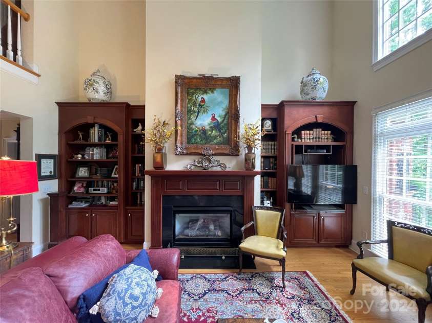 500 Muirfield Drive, Albemarle, NC 28001.  MLS# CAR4138063, YatesRealty ID 15419. Custom built-ins and beautiful fireplace