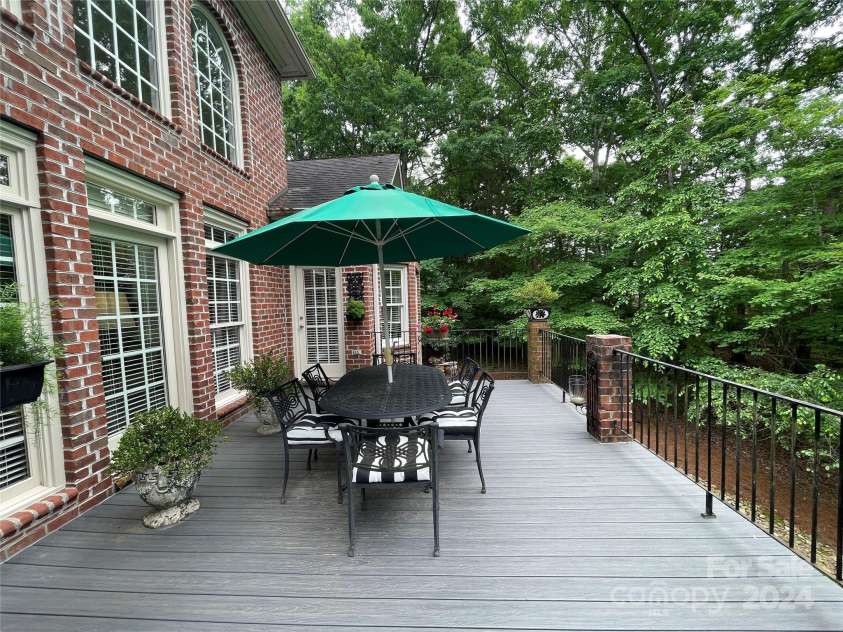 500 Muirfield Drive, Albemarle, NC 28001.  MLS# CAR4138063, YatesRealty ID 15419. Deck off great room, primary bedroom