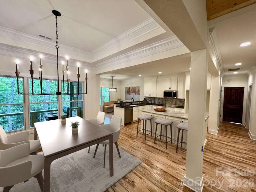 435 Soquili Drive, Brevard, NC 28712.  MLS# CAR4255595, YatesRealty ID 1542. Dinning to Kitchen