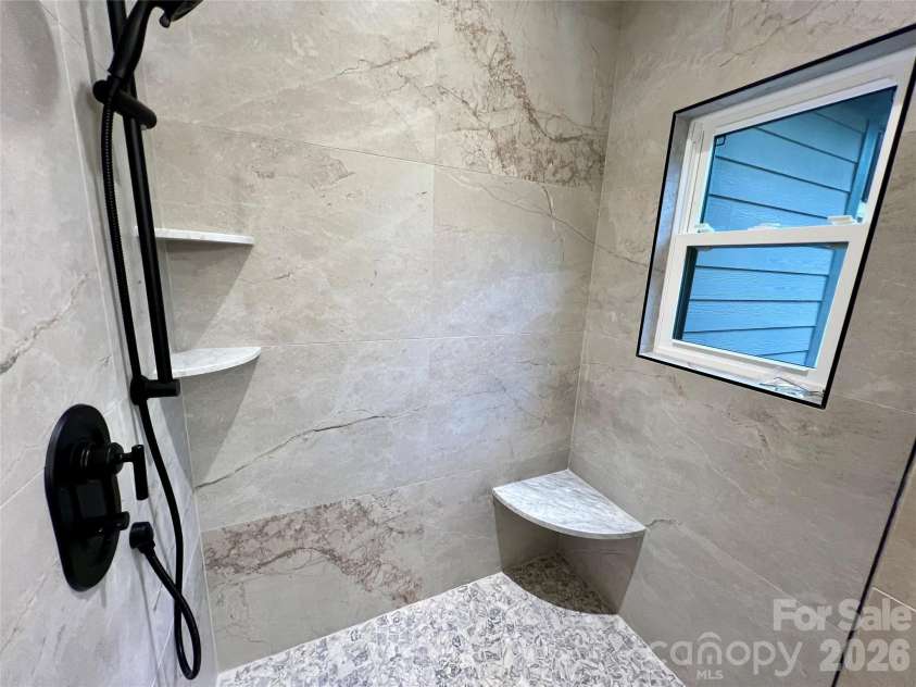 435 Soquili Drive, Brevard, NC 28712.  MLS# CAR4255595, YatesRealty ID 1542. Exquisite Tile