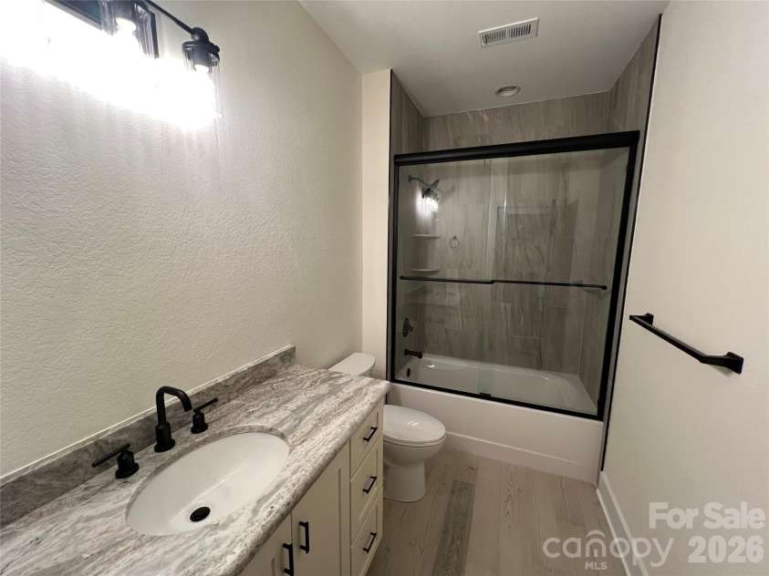 435 Soquili Drive, Brevard, NC 28712.  MLS# CAR4255595, YatesRealty ID 1542. Granite