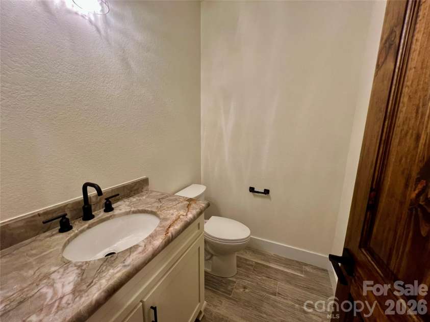 435 Soquili Drive, Brevard, NC 28712.  MLS# CAR4255595, YatesRealty ID 1542. Half Bath