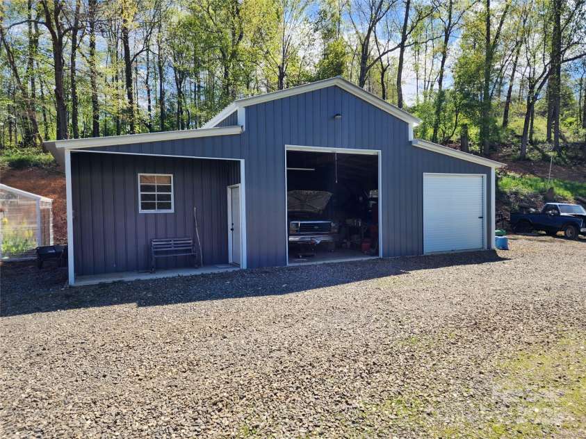 583 Cane Branch Road, Burnsville, NC 28714.  MLS# CAR4251066, YatesRealty ID 15423. 2-bay detached garage with workshop