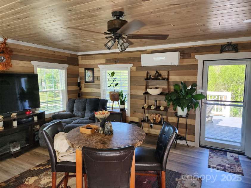 583 Cane Branch Road, Burnsville, NC 28714.  MLS# CAR4251066, YatesRealty ID 15423. Family room/den