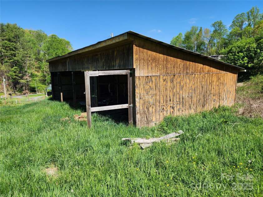 583 Cane Branch Road, Burnsville, NC 28714.  MLS# CAR4251066, YatesRealty ID 15423. Hay/livestock barn