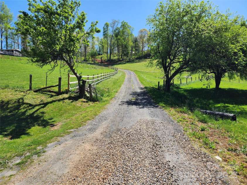 583 Cane Branch Road, Burnsville, NC 28714.  MLS# CAR4251066, YatesRealty ID 15423. Looking up the driveway from Cane Branch Road
