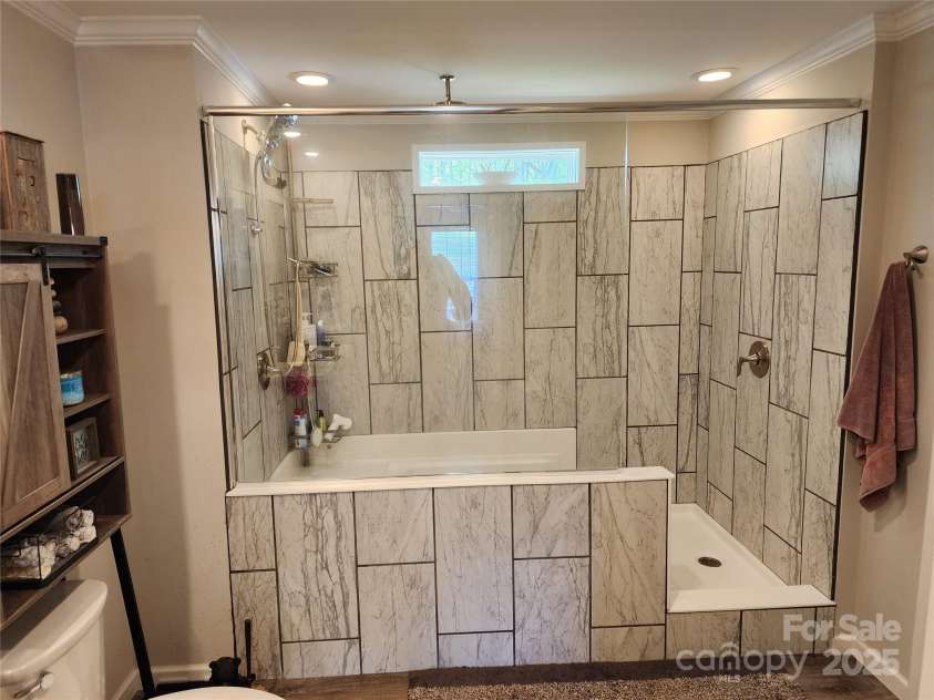 583 Cane Branch Road, Burnsville, NC 28714.  MLS# CAR4251066, YatesRealty ID 15423. Primary bath shower