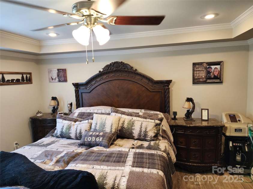 583 Cane Branch Road, Burnsville, NC 28714.  MLS# CAR4251066, YatesRealty ID 15423. Primary bedroom with tray ceiling