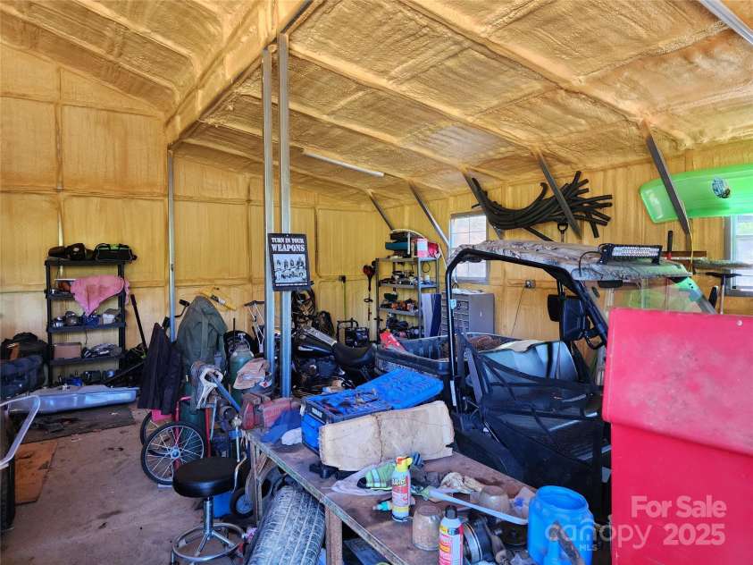 583 Cane Branch Road, Burnsville, NC 28714.  MLS# CAR4251066, YatesRealty ID 15423. View of interior of the garage bay 2