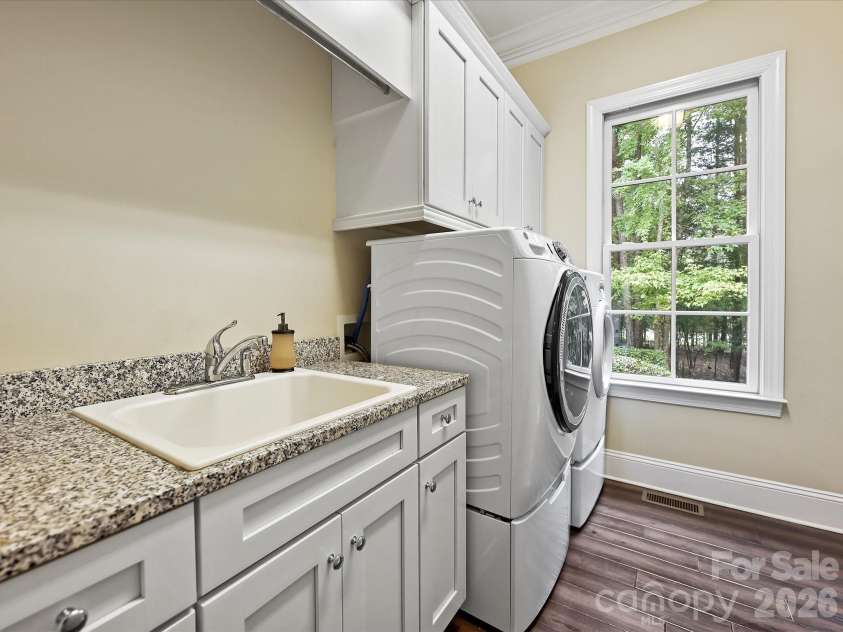 4113 Piaffe Avenue, Mint Hill, NC 28227.  MLS# CAR4356294, YatesRealty ID 15425. Laundry Room