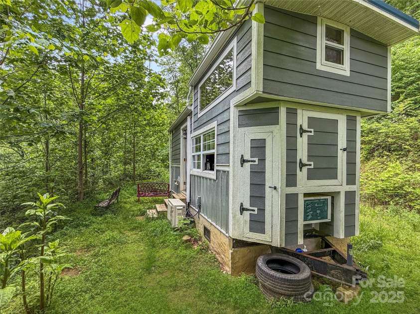 574 Allen Drive, Marshall, NC 28753.  MLS# CAR4262974, YatesRealty ID 15426. Side - Towards Entrance