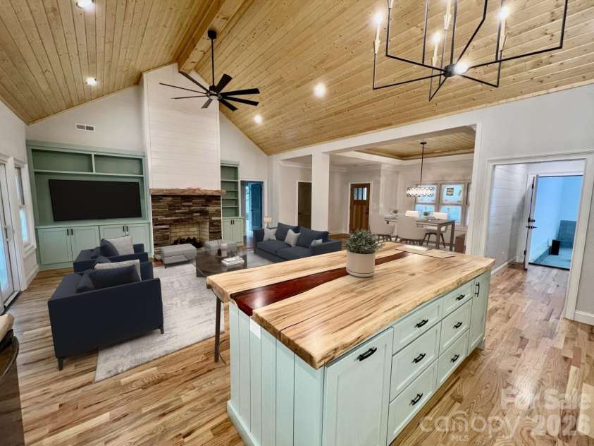 397 Soquili Drive, Brevard, NC 28712.  MLS# CAR4206304, YatesRealty ID 1543. Kitchen to Great Room