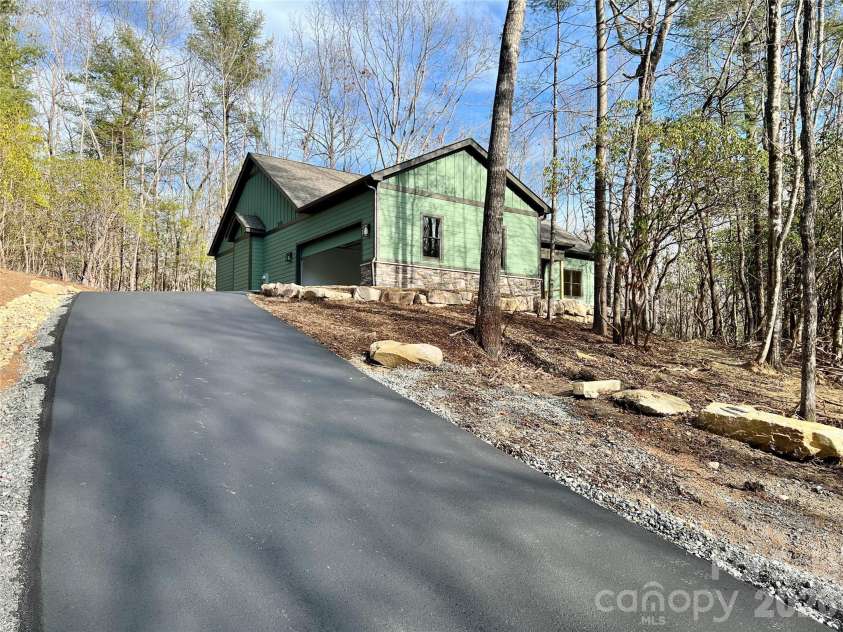 397 Soquili Drive, Brevard, NC 28712.  MLS# CAR4206304, YatesRealty ID 1543. Paved Driveway