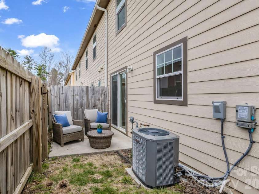 1106 Lynwood Forest Road, Arden, NC 28704.  MLS# CAR4359769, YatesRealty ID 15430. Patio virtually staged