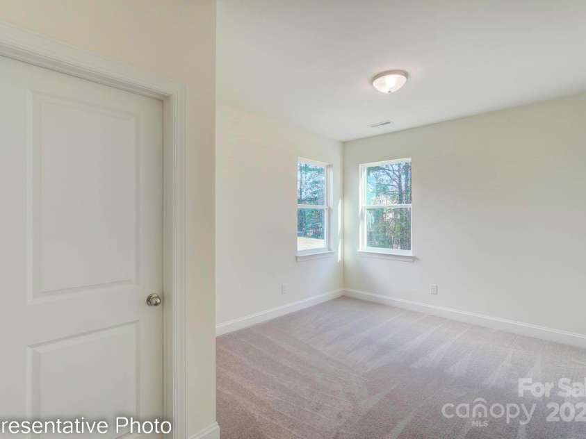 3242 Bozeman Court, Stanley, NC 28164.  MLS# CAR4250904, YatesRealty ID 15431. Guest Bedroom on Main