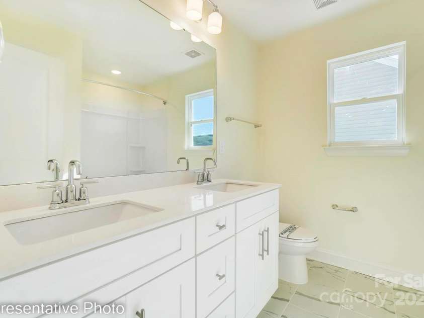 3242 Bozeman Court, Stanley, NC 28164.  MLS# CAR4250904, YatesRealty ID 15431. Hall Bath