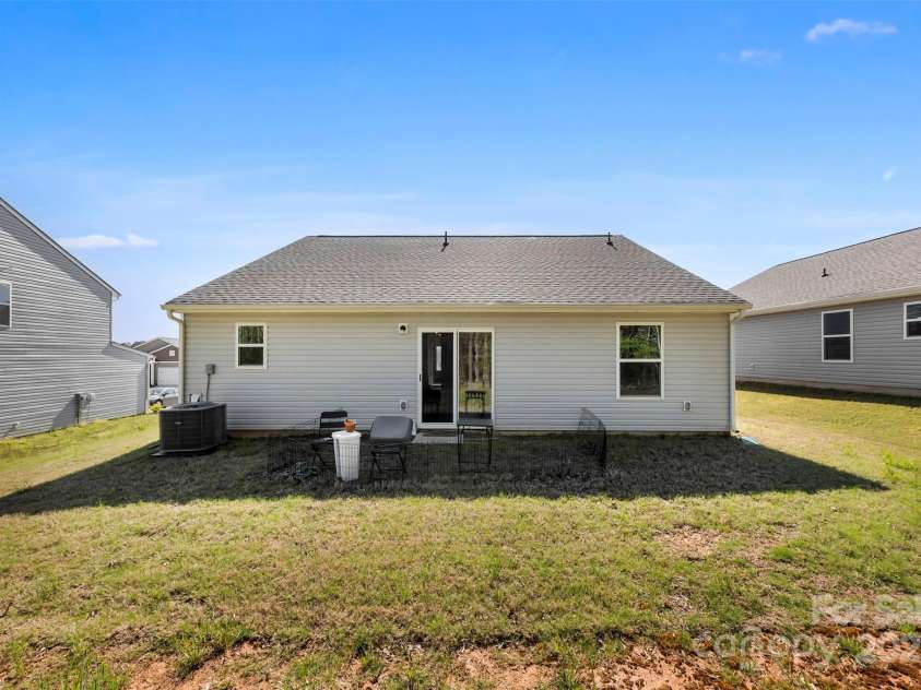 3118 Maple Ridge Drive, Gastonia, NC 28052.  MLS# CAR4243632, YatesRealty ID 15433. Back of the house