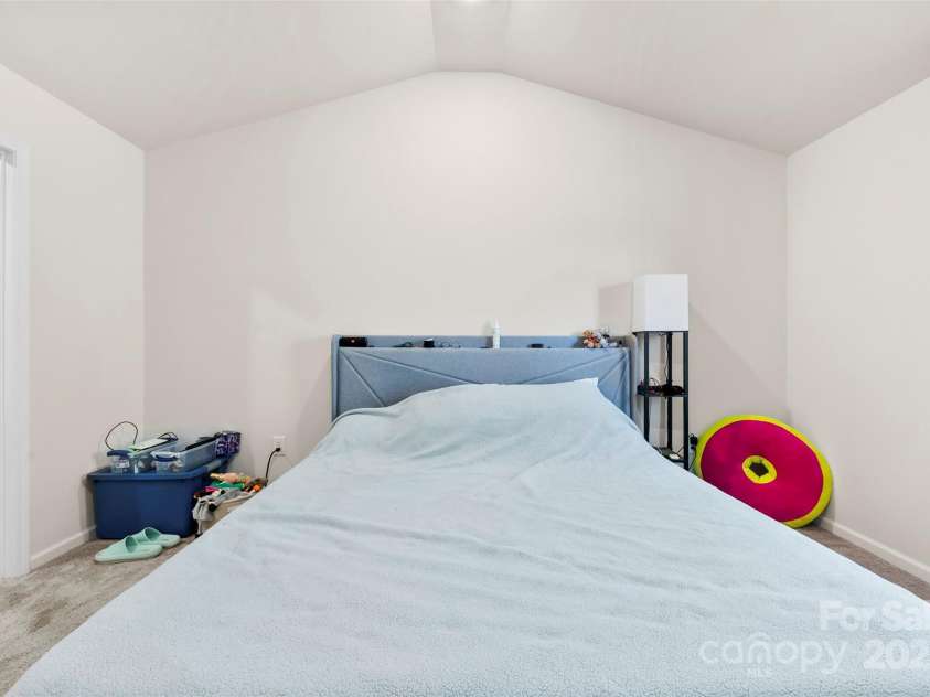 3118 Maple Ridge Drive, Gastonia, NC 28052.  MLS# CAR4243632, YatesRealty ID 15433. Bedroom with vaulted ceilings