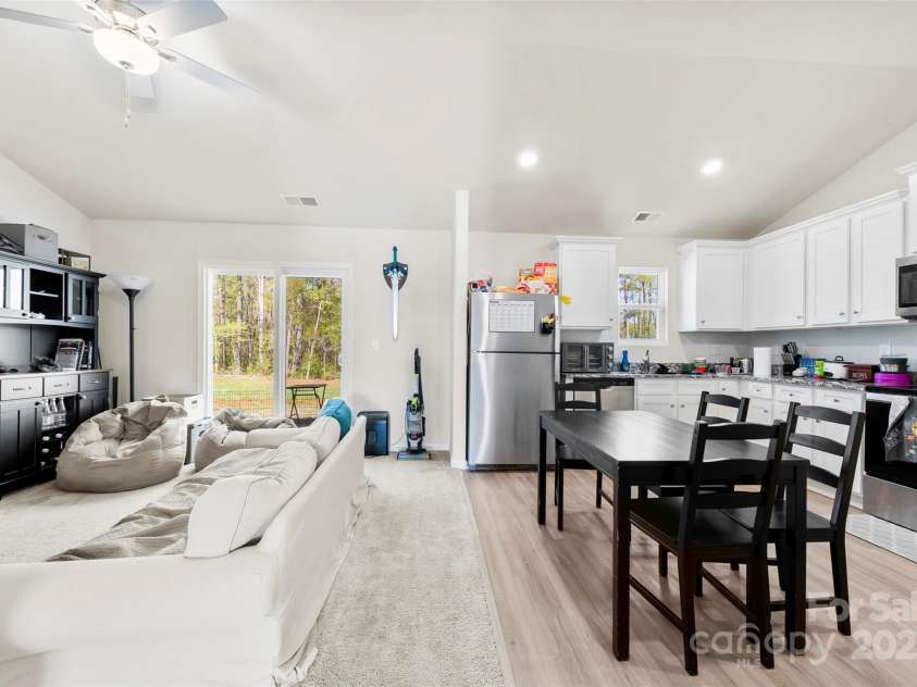 3118 Maple Ridge Drive, Gastonia, NC 28052.  MLS# CAR4243632, YatesRealty ID 15433. Open view of the kitchen and living room