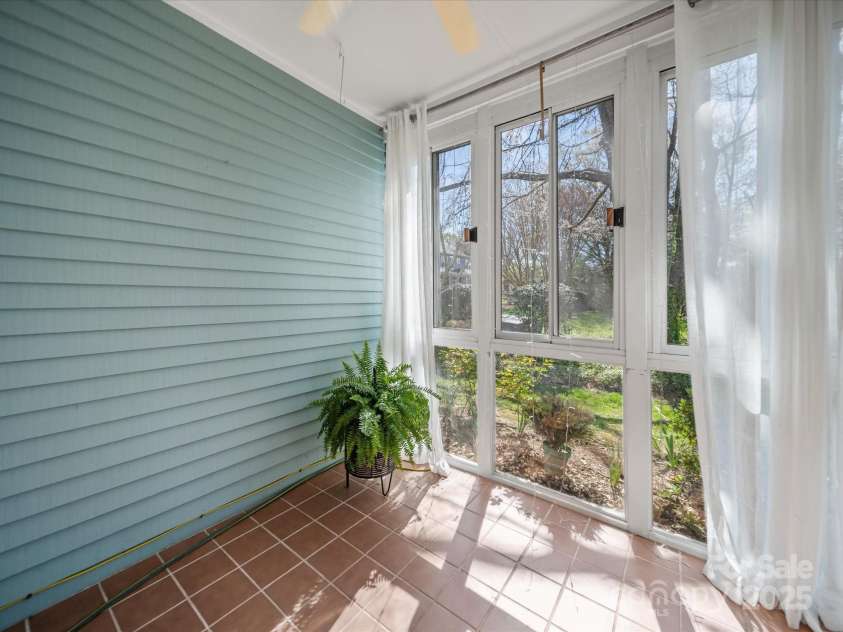 18758 Silver Quay Drive, Cornelius, NC 28031.  MLS# CAR4238668, YatesRealty ID 15441. Glass enclosed porch