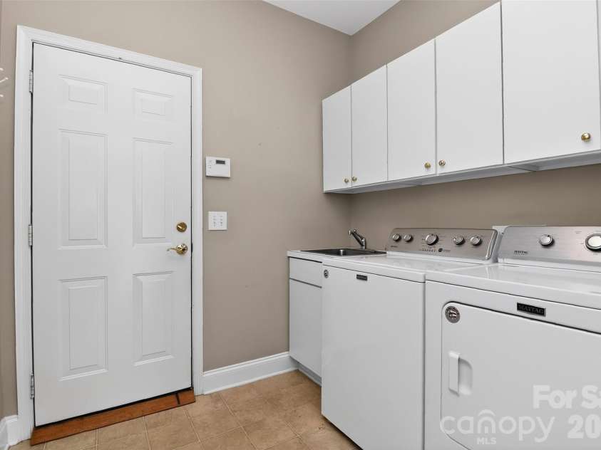 2525 Old Ashworth Lane, Concord, NC 28027.  MLS# CAR4370913, YatesRealty ID 15446. Laundry