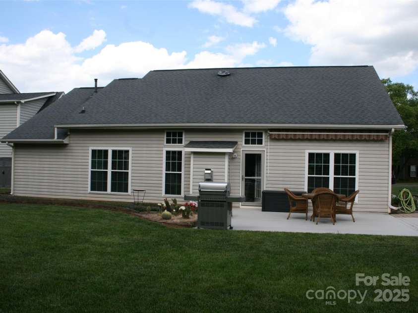4711 Lenox Hill Place, Charlotte, NC 28269.  MLS# CAR4261268, YatesRealty ID 15448. Rear View of home