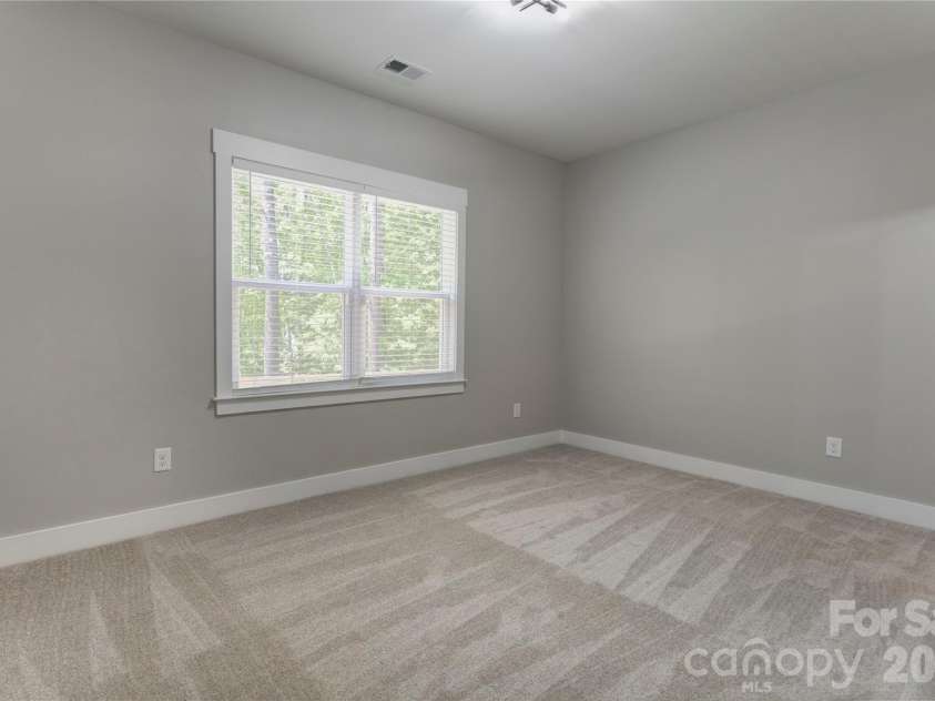 9311 Willowglen Trail, Charlotte, NC 28215.  MLS# CAR4372913, YatesRealty ID 15451. Basement Bedroom