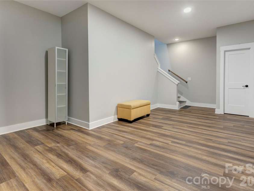 9311 Willowglen Trail, Charlotte, NC 28215.  MLS# CAR4372913, YatesRealty ID 15451. Basement Play room