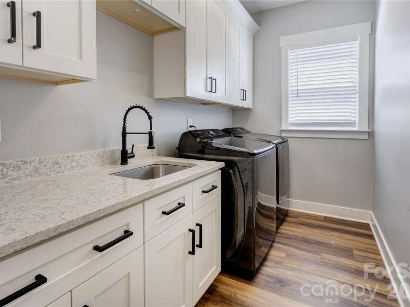 9311 Willowglen Trail, Charlotte, NC 28215.  MLS# CAR4372913, YatesRealty ID 15451. Laundry room. Washer/Dryer included