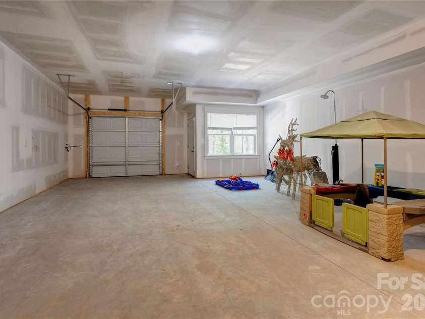 9311 Willowglen Trail, Charlotte, NC 28215.  MLS# CAR4372913, YatesRealty ID 15451. Third Garage Space in Basement with extra storage